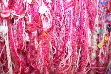 Pink yarns or threads for texture or backgroundの写真素材