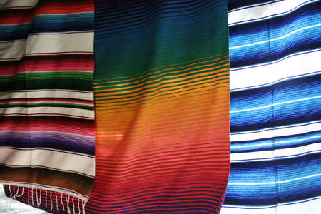 Colorful Mexican blankets for sale at market in Yucatanの写真素材
