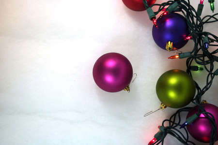 Christmas ornaments and lights with white backgroundの写真素材