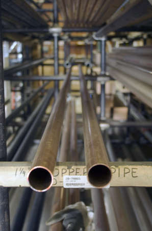 copper pvc pipes in warehouseの写真素材