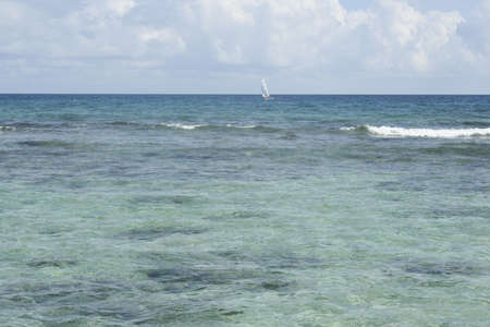 mexican carribean beaches waves pier sailboat rocksの写真素材