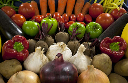 Fresh vegetables spread out for displayの写真素材