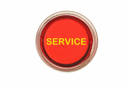 Closeup of red push button switch for emergency or help or service call functionの写真素材