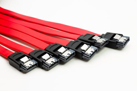 Multiple sata harddisk cables arranged in a row, showcasing their connectivity for efficient data...