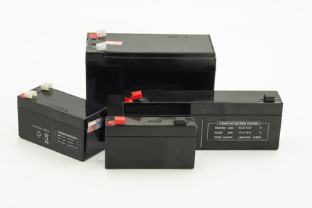 Several sealed lead acid batteries are displayed showcasing their various sizes, suitable for multiple energy solutions and devices.の写真素材