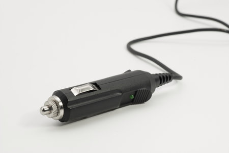 This device is designed for connecting electronic accessories in vehicles, providing a power source through the cigarette lighter socket.の写真素材