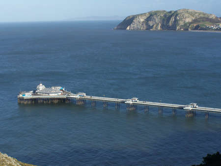 Pier with mountain in the background.の写真素材