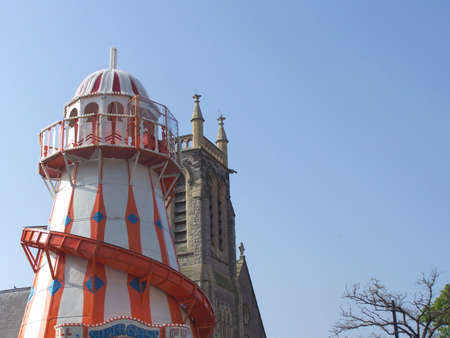 Helter skelter with church in the background at victorian extravaganza, Llandudno, North wales.  conwy.の写真素材