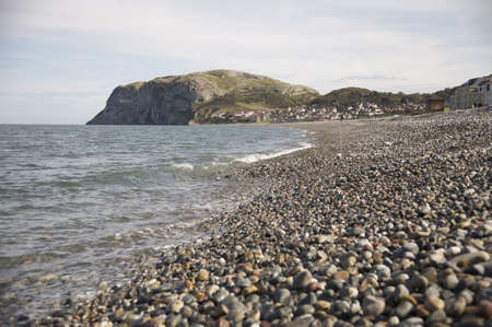 Llandudno pebbled beach. With The Little Orme. の写真素材