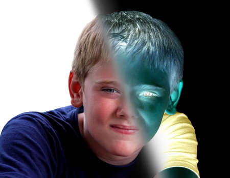 Young Boy Portrait Opposite Mind-sets Positive and Negativeの写真素材