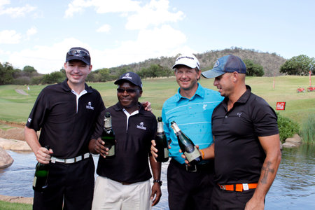 TOURNAMENT WINNERS  - NOVEMBER 17: Gary Player Charity Invitational Golf Tournament  November  17, 2013, Sun City, South Africa. From left businessmen Anthony Leeming and Mike Dladla, former Proteas cricketer Herschelle Gibbs and double US Open champion Rのeditorial素材