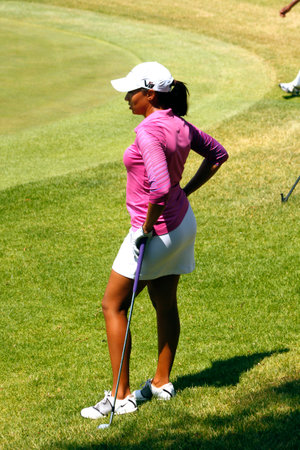 WOODS, CHEYENNE - NOVEMBER 17: Professional Golfer Playing at Gary Player Charity Invitational Golf Tournament waiting turn at green November  17, 2013, Sun City, South Africa. Cheyenne Woods is a niece of Tiger Woods.のeditorial素材
