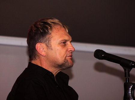 HOFMEYR, STEVE - JULY 26  Singer, Songwriter and Actor Performing a Song on Stage on July 26, 2013, Rustenburg, South Africa  Side profile in front of picrophone のeditorial素材