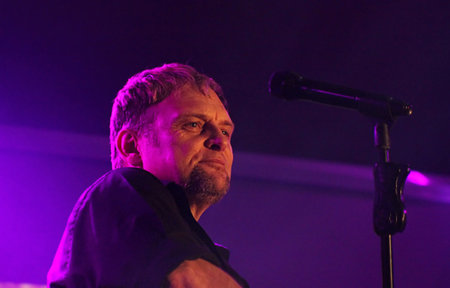 HOFMEYR, STEVE - JULY 26  Singer, Songwriter and Actor Performing a Song on Stage on July 26, 2013, Rustenburg, South Africa  Playing on guitar with purple backlight のeditorial素材