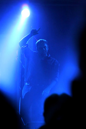 HOFMEYR, STEVE- JULY 26  Singer, Songwriter and Actor Performing a Song on Stage on July 26, 2013, Rustenburg, South Africa  Finger in air with blue backlight のeditorial素材