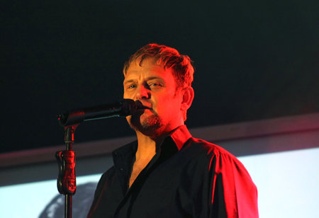 HOFMEYR, STEVE - JULY 26  Singer, Songwriter and Actor Performing a Song on Stage on July 26, 2013, Rustenburg, South Africa  Singing with red backlight のeditorial素材