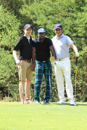 JOSEPH, JOHNATHAN - NOVEMBER 15: Radio Celebrity Playing at Gary Player Charity Invitational Golf Tournament jokingly having his hands full on November 15, 2015, Sun City, South Africa.のeditorial素材