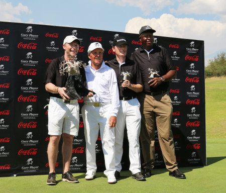 WINNING TEAM - NOVEMBER 15: Ronan Keating, Gary Player, Dr. Hans-Walter Peters and Sello Moloko winners by 11 strokes at Gary Player Charity Invitational Golf Tournament on November 15, 2015, Sun City, South Africa.のeditorial素材