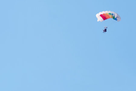 RUSTENBURG, SOUTH AFRICA - April 28, 2017: National Skydiving Championships. Sky diver with brightly...