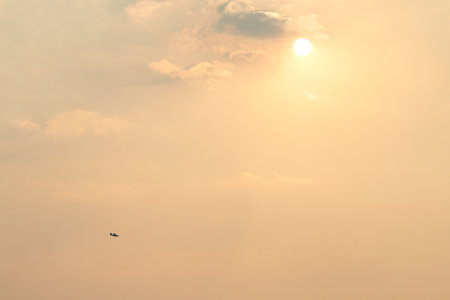 RUSTENBURG, SOUTH AFRICA - April 28, 2017: National Skydiving Championships.  X328 Atlas Angel Turbine specially equipped aircraft for sky divers flying off against picturesque sunset  after final drop of day.のeditorial素材