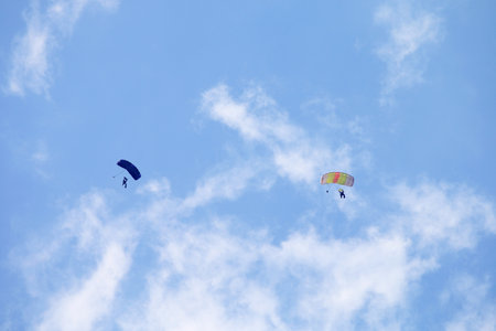 RUSTENBURG, SOUTH AFRICA - April 28, 2017: National Skydiving Championships. Two skydivers with...