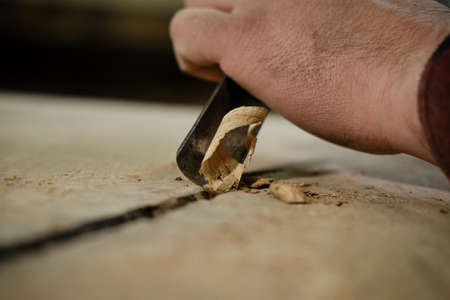 Close up Traditional craftsman carving wood. Vercion 2の写真素材