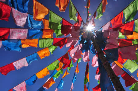 Prayer flags under the blue skyの写真素材