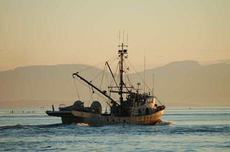 Fishboat at Sunsetの写真素材