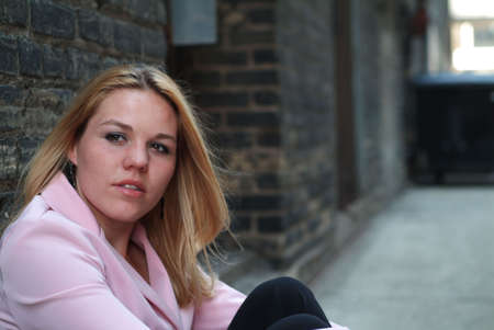 woman in alleyの写真素材