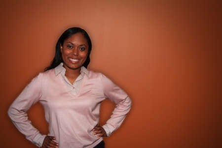 young woman with hands on hips