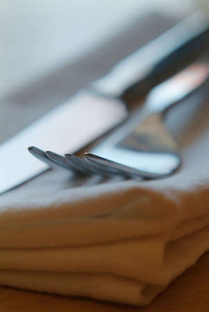 fork an d knife on napkin