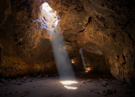 Sun Beams Shine Down Through Cave Ceiling 3の写真素材