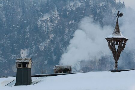 chimney of an old house in winterの写真素材