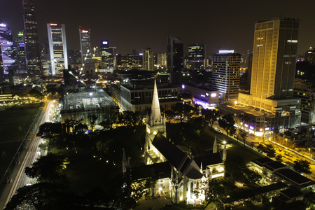 The St. Andrew's Cathedral in Saingapore at nightの写真素材