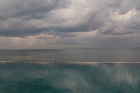 cloudy morning at the pool in Baliの写真素材
