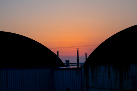 a bavarian biogas plant at sundownの写真素材