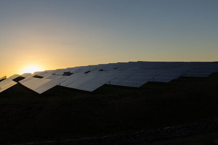 a big photovoltaik complex at sundownの写真素材