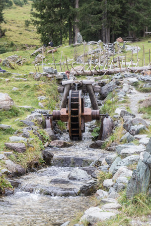 a little water fall or better water game in the mountainsの写真素材
