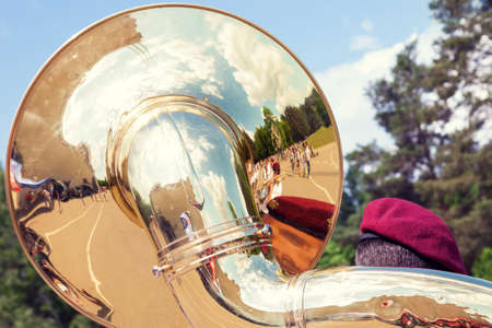 Detail of sousaphone played by military orchestra shot from behindの写真素材