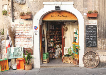 Cagliari, Italy - July 07, 2016: Entrance of traditional local food grocery shop in the old town of Cagliari, Italyのeditorial素材