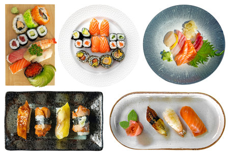 Various kinds of served ready to eat sushi and sashimi isolated on white background. Japanese food cut out set, top viewの写真素材