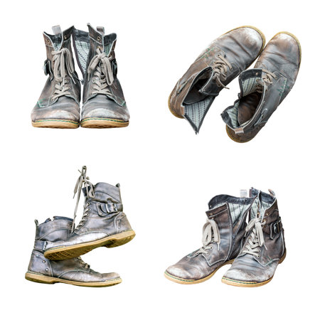 Old worn out leather shoes from different angles isolated, weathered footwear cutout setの写真素材