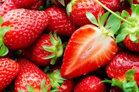 Background of fresh red strawberries ready to be eaten.