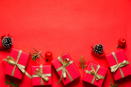 Christmas decoration on red background. Copyspace.