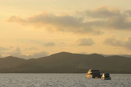 Boats In the Afternoon Glow Near Langkawi Island, Malaysiaの写真素材