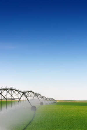 Crop Irrigation using the center pivot sprinkler system の写真素材