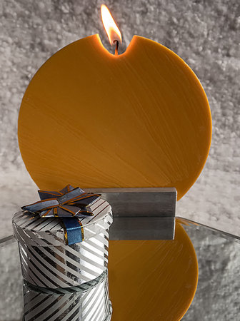 The gifts and candle to Cristmasの写真素材