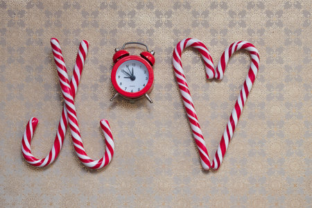 Merry Christmas Symbol love and alarm clocks