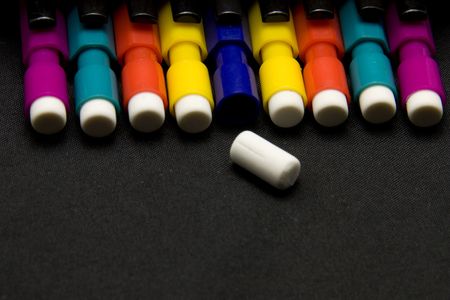 mechanical pencils lined up and a loose eraserの写真素材