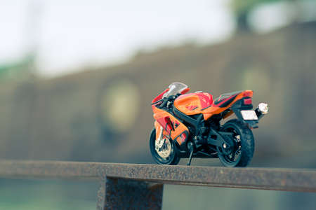 A model of a street bike resting on the gateの写真素材